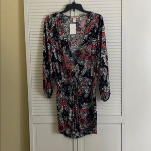 H and M romper size 12 fits like 10